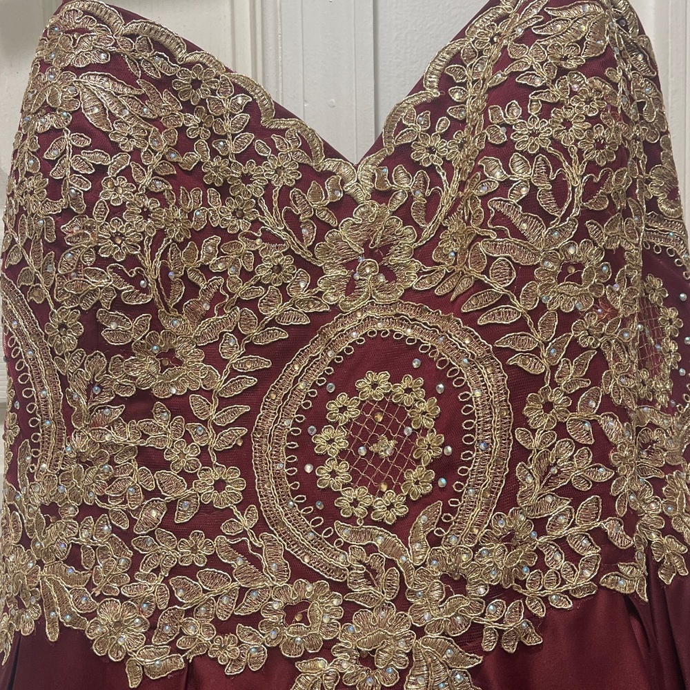 Gold and burgundy ball gown to make you feel like the ultimate princess!